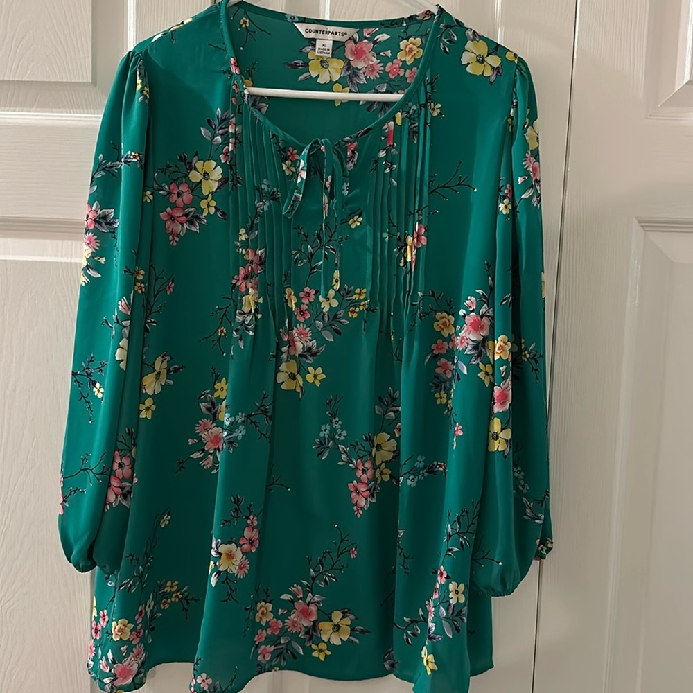 Green floral blouse